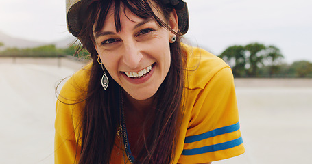 Image showing Portrait, woman and smile at skate park, skating in city with happiness, sports and fitness outdoor. Recreation, hobby and active lifestyle with happy female, face and skater with extreme sport