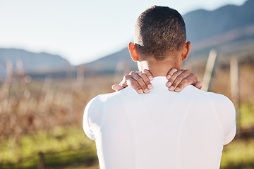 Image showing Fitness, nature and man with a back injury, pain or accident after running training for race. Sports, medical emergency and male athlete with sprain muscle, injured or sore body after cardio workout.