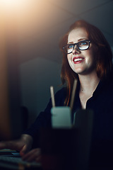 Image showing Business woman, smile and computer at night typing email in communication at work for project deadline at office. Vertical of female employee working late in the evening on desktop PC or technology