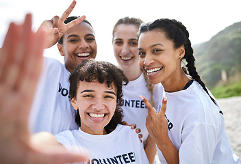 Image showing Peace sign, selfie and volunteer women at beach taking photo for earth day, environmental sustainability or recycling. V emoji, community service and group portrait of happy girls or friends laughing