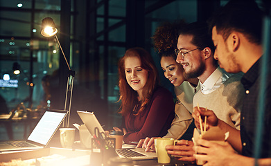 Image showing Business people, laptop and collaboration at night for team planning, project deadline or strategy at office. Group of employee designers busy working overtime or late evening together on computer