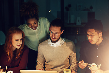 Image showing Business people, laptop and planning at night for team collaboration, project deadline or strategy at office. Group of employee designers busy working overtime or late evening in teamwork on computer