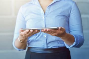 Image showing Hands, internet and business woman holding a tablet connected to wifi for the web, website and app for technology. Person, corporate and employee working for digital marketing or social media