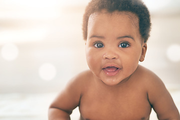 Image showing Cute baby, black kid and happy portrait with bokeh, mockup and space in nursery room, happiness and relax. Young infant child, girl and smile of healthy development, growth and adorable face in house