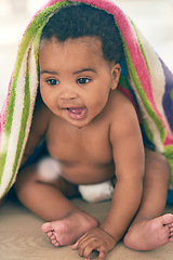 Image showing Cute baby, black child and blanket for play, game and peekaboo on nursery room floor, happiness and fun. Happy young infant kid, girl and smile for healthy development, growth and lifestyle in house