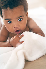 Image showing Cute baby, black child and crawling on blanket for play, fun and relax in nursery room. Adorable young african infant kids, girl and face of healthy development, growth and learning to crawl in house