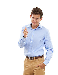 Image showing Portrait, pointing and mockup with a business man in studio isolated on a white background for choice. Fashion, point and smile with a happy young male standing hand in pocket on blank mock up space