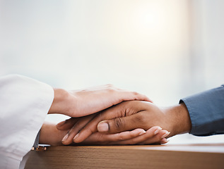 Image showing Hands, support and healthcare with doctor and patient, diagnosis and empathy with comfort and people at hospital. Trust, holding hand and help with advice and medical results with health insurance