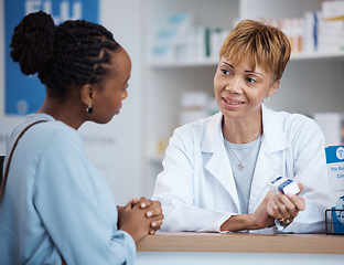 Image showing Healthcare, help and black woman with pharmacist at counter for advice on safe medicine and prescription drugs. Health, pharmaceutical info and patient consulting medical professional at pharmacy.