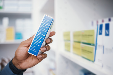 Image showing Pharmacy, medicine and pills, man and box in hand, healthcare and prescription medication in drug store. Medical, closeup and pharmaceutical product for health, wellness and treatment with pharmacist