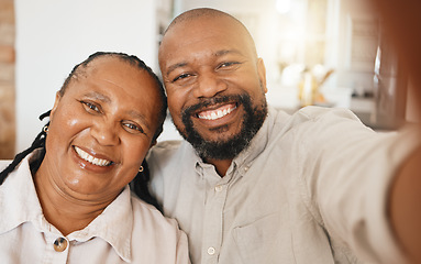 Image showing Smile, selfie and mature black couple in home with happiness and love in relationship together. Self portrait, happy face and man with woman taking romantic picture for social media in South Africa.