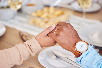 Image showing Holding hands, people and praying thanks on food, lunch or worship at dinner table. Closeup, prayer and eating together in religion, trust or appreciation of christian support, respect or care of god