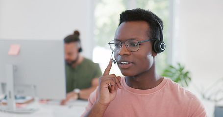 Image showing Customer support communication, call center or black man consulting on contact us CRM, telemarketing or telecom. Ecommerce, customer service or information technology consultant talking on microphone