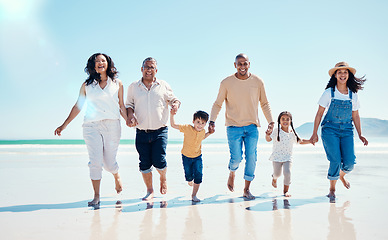 Image showing Portrait, family holding hands and walking on beach, quality time and bonding together. Face, parents and children with grandchildren, seaside vacation and holiday with happiness, love and traveling