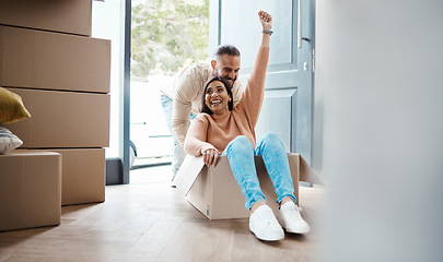 Image showing Real estate, boxes and happy couple celebrate for moving in new home, property investment and life together. Mature people or woman with partner celebration, success and cardboard box for house