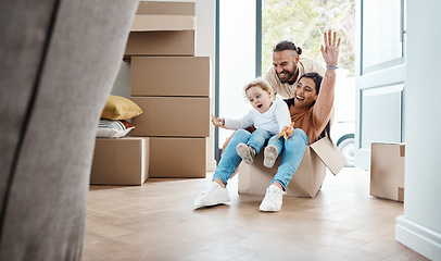 Image showing Happy family play in cardboard box for new house, moving and real estate celebration, investment and excited game. Mom, dad and kid or child play in boxes while moving into property home together