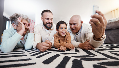 Image showing Happy big family, smile and take selfie in home living room for memory or social media. Photographer care, comic face and father, grandparents and child on floor taking pictures, bonding or laughing.