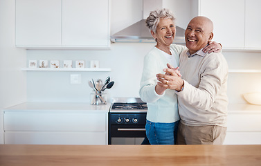 Image showing Love, dance and portrait of old couple in kitchen at home, weekend time and celebrate romance with smile. Retirement, happiness and health, happy man and senior woman dancing in house or apartment.
