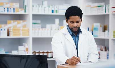 Image showing Pharmacist, stock or black man writing on clipboard for medicine check, retail research or medical prescription in drugstore. Notes, pharmacy or worker on paper documents in pills checklist or order