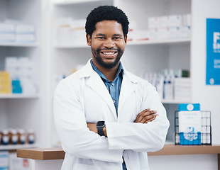 Image showing Pharmacist, black man or arms crossed in portrait, medicine trust or about us healthcare in medical insurance drugstore. Smile, happy or confident pharmacy worker in retail leadership or consulting