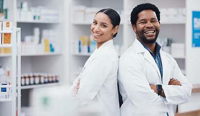 Image showing Pharmacists, teamwork and arms crossed in portrait, medicine trust or about us healthcare in medical drugstore collaboration. Smile, happy and confident pharmacy people in retail consulting or help