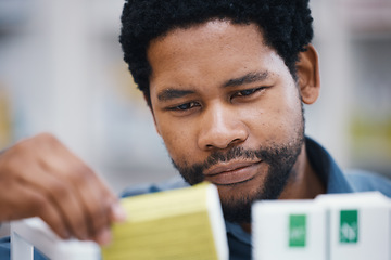 Image showing Pharmacy, medicine and pills, black man and face, healthcare and prescription medication in drug store. Medical, closeup and pharmaceutical product for health, wellness and treatment with pharmacist