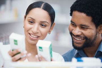 Image showing Pharmacist, worker or helping customer with medicine information, pills instruction or medical consulting in store. Happy pharmacy woman, black man or patient with retail drugs or healthcare product
