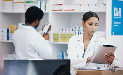 Image showing Pharmacist, worker or digital tablet for medicine check, stock take or medical research in drugs store. Smile, happy or pharmacy woman on technology for pills, checklist or ecommerce healthcare order