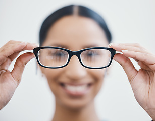 Image showing Customer, hands or glasses in eyes care, healthcare wellness or optometry help at retail store, shop or medical clinic. Zoom, patient or woman with eyewear, prescription lens or designer vision frame