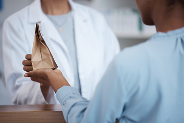 Image showing Hands, pharmacy and customer shopping for medicine, product or medication. Healthcare, wellness and black woman buying pills, supplements or medical drugs from pharmacist in drugstore or retail shop.