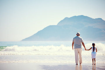 Image showing Holding hands, relax and grandfather with child at beach for holiday, bonding and vacation mockup. Affectionate, travel and happiness with old man and girl walking for summer break, fun and support