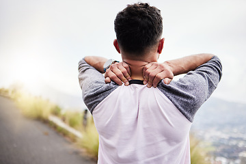 Image showing Neck pain, fitness and athlete of a man on a road for workout, running sport and exercise. Joint strain, run problem and runner back of a person holding a sports muscle issue outdoor for training