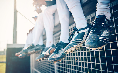 Image showing Baseball feet, team and sport field stadium for fitness, workout and game exercise. Softball shoes, sports group and summer outdoor with people sitting on an athlete training break together