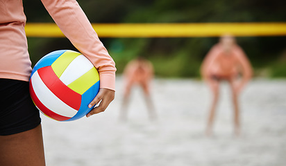 Image showing Volleyball, beach body or hand of woman playing a game in training or team workout in summer together. Sports fitness, zoom or healthy girl on sand ready to start a fun competitive match in Brazil