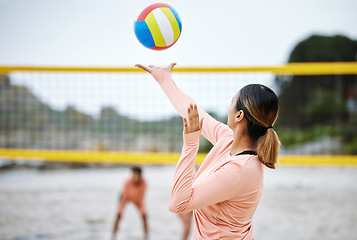 Image showing Volleyball, beach or serve of sports women playing a game in training or workout in summer together. Team fitness, freedom or healthy friends on sand ready to start a fun competitive match in Brazil