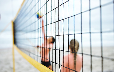 Image showing Volleyball, net or sports women at beach playing a game in training or workout in summer together. Team fitness, jumping or active friends on sand ready to start a fun competitive match in Brazil
