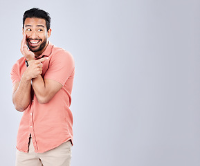 Image showing Mockup, gossip and man with a secret in studio for whisper, drama or rumor against grey background. Asian, model and guy sharing, whispering and sneaky, telling and mysterious while advertising space