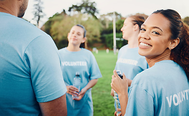 Image showing Portrait, smile and volunteer woman with team outdoors for climate change, charity cleaning and recycling. Earth day, community service and happy female with group of environmental people at park.