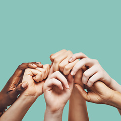 Image showing Praying, hands and people united in prayer, worship or community encouragement in studio. Diversity, pray and worship by group in church for praise, help or hope, blessing and God on green background