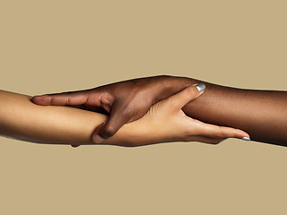Image showing Hands, diversity and support with people in studio on a brown background for unity or solidarity. Team building, partnership and trust with women holding arms in collaboration for help, care or love