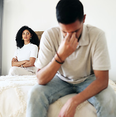 Image showing Divorce, sad and couple breakup or fighting in a bedroom unhappy with relationship due o cheating in a home or house. Woman, man or people with stress arguing in sadness due to infidelity