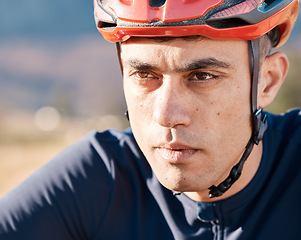 Image showing Serious, cycling and face of man in nature for training, fitness and cardio. Focus, vision and professional biker in the countryside for a marathon, race or triathlon for sports, exercise and riding