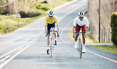 Image showing Cycling, sports and men or friends on road travel, fitness or marathon training in urban street competition or race. Exercise bicycle of athlete people in teamwork, triathlon journey and safety gear