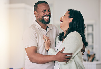 Image showing Senior black couple, home and laugh together with hug, happiness or relax for funny memory with love. Black man, woman and mature in house for embrace, comic time or bonding for comedy, happy or care