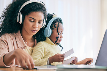 Image showing Headphones, elearning and girl with mother and homework flash cards for study in a home. Online learning, digital kids app and computer of a child with a mom helping with school reading in a house