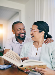 Image showing Home reading, black couple and marriage with love, support and care in a house. Book, smile and happiness of a older woman and man together feeling happy in early retirement in the morning with books