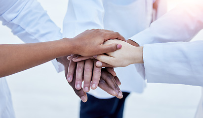 Image showing Support, teamwork and medical with hands of doctors for community, diversity and solidarity. Healthcare, synergy and stack with group of people for mission, medicine and motivation in hospital