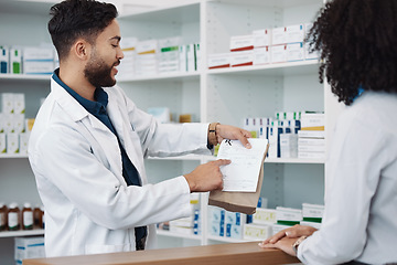 Image showing Medication, prescription and explaining with a pharmacist man talking to a woman customer for healthcare. Medicine, consulting and insurance with a male health professional working in a pharmacy