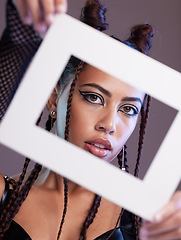 Image showing Fashion, frame and portrait of a woman in a studio with a grunge, edgy and goth outfit and makeup. Stylish, beauty and female model with a trendy, cool and emo style isolated by a gray background.