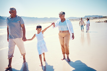 Image showing Relax, travel and holding hands with big family on beach for vacation, summer break and generations. Happiness, holiday and bonding with grandparents and children walking for love, rest and trip